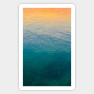 Relaxing ocean surface with sunset colors Sticker